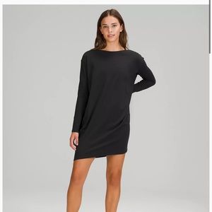 Back in action long sleeve lulu lemon dress. Brand new but tags removed.